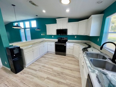 CHECK OUT THIS HOME in the sought after 55+ Gated Community of on Water Oak Country Club Estates in Florida - for sale on GolfHomes.com, golf home, golf lot