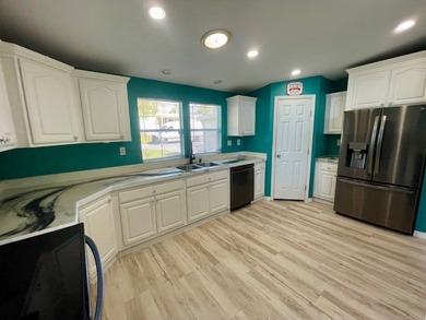 CHECK OUT THIS HOME in the sought after 55+ Gated Community of on Water Oak Country Club Estates in Florida - for sale on GolfHomes.com, golf home, golf lot