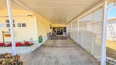 This spacious 2-bedroom, 1.5-bath single-wide home with on Betmar Acres Golf Club in Florida - for sale on GolfHomes.com, golf home, golf lot