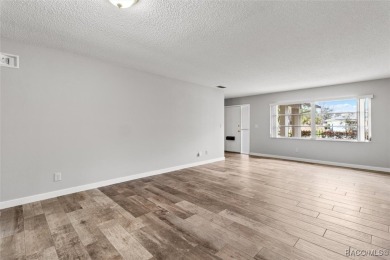 This beautifully remodeled home is right in the HEART of golf on Plantation Inn and Golf Resort  in Florida - for sale on GolfHomes.com, golf home, golf lot