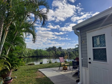 Situated Right On The Lake , Super Cute Fully Furnished Home ! on Riverwood Golf Club in Florida - for sale on GolfHomes.com, golf home, golf lot