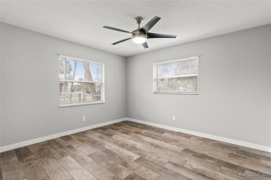 This beautifully remodeled home is right in the HEART of golf on Plantation Inn and Golf Resort  in Florida - for sale on GolfHomes.com, golf home, golf lot