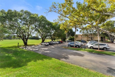 This first-floor corner unit features balcony with amazing golf on Bonaventure Country Club in Florida - for sale on GolfHomes.com, golf home, golf lot