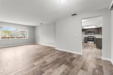 This beautifully remodeled home is right in the HEART of golf on Plantation Inn and Golf Resort  in Florida - for sale on GolfHomes.com, golf home, golf lot
