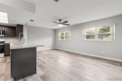 This beautifully remodeled home is right in the HEART of golf on Plantation Inn and Golf Resort  in Florida - for sale on GolfHomes.com, golf home, golf lot
