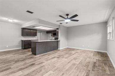 This beautifully remodeled home is right in the HEART of golf on Plantation Inn and Golf Resort  in Florida - for sale on GolfHomes.com, golf home, golf lot