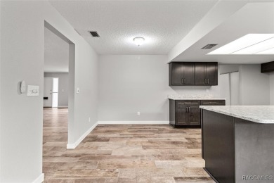 This beautifully remodeled home is right in the HEART of golf on Plantation Inn and Golf Resort  in Florida - for sale on GolfHomes.com, golf home, golf lot