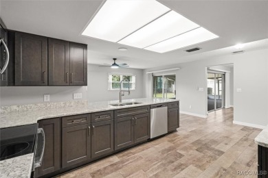 This beautifully remodeled home is right in the HEART of golf on Plantation Inn and Golf Resort  in Florida - for sale on GolfHomes.com, golf home, golf lot