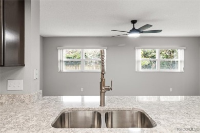 This beautifully remodeled home is right in the HEART of golf on Plantation Inn and Golf Resort  in Florida - for sale on GolfHomes.com, golf home, golf lot