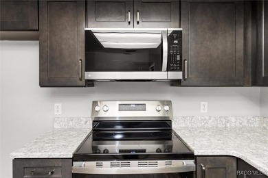 This beautifully remodeled home is right in the HEART of golf on Plantation Inn and Golf Resort  in Florida - for sale on GolfHomes.com, golf home, golf lot
