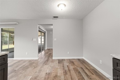 This beautifully remodeled home is right in the HEART of golf on Plantation Inn and Golf Resort  in Florida - for sale on GolfHomes.com, golf home, golf lot