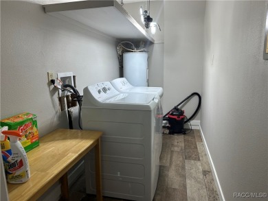 This beautifully remodeled home is right in the HEART of golf on Plantation Inn and Golf Resort  in Florida - for sale on GolfHomes.com, golf home, golf lot