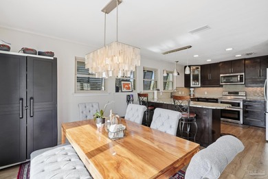 Deep water canal-front home in Gulf Breeze! Boating enthusiasts on Tiger Point Golf and Country Club in Florida - for sale on GolfHomes.com, golf home, golf lot