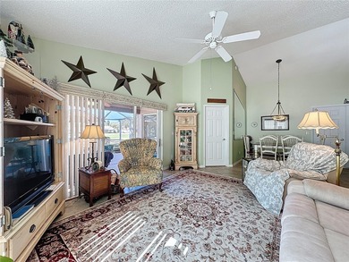 Canterbury model on the Championship golf course in 55+ gated on Kings Ridge Golf Club in Florida - for sale on GolfHomes.com, golf home, golf lot