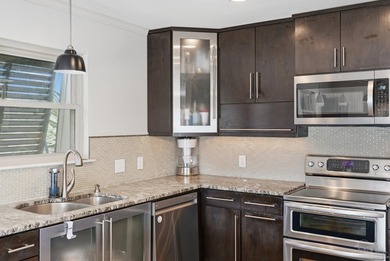 Deep water canal-front home in Gulf Breeze! Boating enthusiasts on Tiger Point Golf and Country Club in Florida - for sale on GolfHomes.com, golf home, golf lot