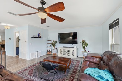 Deep water canal-front home in Gulf Breeze! Boating enthusiasts on Tiger Point Golf and Country Club in Florida - for sale on GolfHomes.com, golf home, golf lot