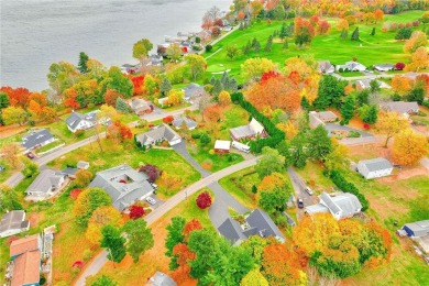 EXPERIENCE YEAR-ROUND RESORT-STYLE LIVING! **OPEN SATURDAY 11/23 on Sodus Bay Heights Golf Club in New York - for sale on GolfHomes.com, golf home, golf lot