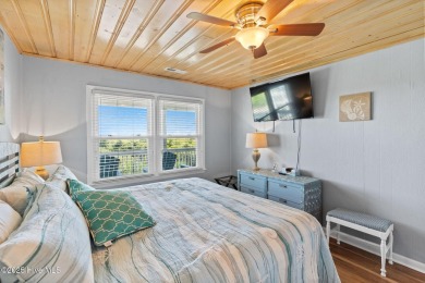 Charming ocean front cottage on the reserved island of Sunset on Oyster Bay Golf Links in North Carolina - for sale on GolfHomes.com, golf home, golf lot