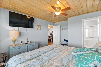 Charming ocean front cottage on the reserved island of Sunset on Oyster Bay Golf Links in North Carolina - for sale on GolfHomes.com, golf home, golf lot