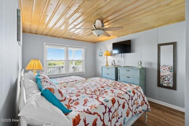 Charming ocean front cottage on the reserved island of Sunset on Oyster Bay Golf Links in North Carolina - for sale on GolfHomes.com, golf home, golf lot