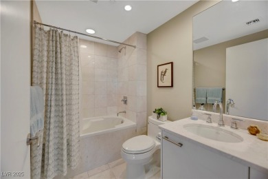 An exceptional corner residence featuring floor-to-ceiling on Las Vegas Country Club in Nevada - for sale on GolfHomes.com, golf home, golf lot