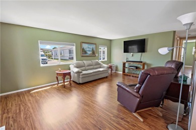 2 bed/2 bath in a cul-de-sac, long driveway w/space for vehicles on Barefoot Bay Golf Course in Florida - for sale on GolfHomes.com, golf home, golf lot