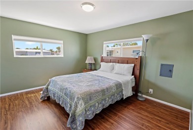 2 bed/2 bath in a cul-de-sac, long driveway w/space for vehicles on Barefoot Bay Golf Course in Florida - for sale on GolfHomes.com, golf home, golf lot