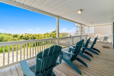 Charming ocean front cottage on the reserved island of Sunset on Oyster Bay Golf Links in North Carolina - for sale on GolfHomes.com, golf home, golf lot