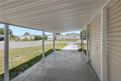 2 bed/2 bath in a cul-de-sac, long driveway w/space for vehicles on Barefoot Bay Golf Course in Florida - for sale on GolfHomes.com, golf home, golf lot