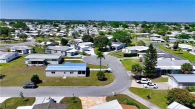 2 bed/2 bath in a cul-de-sac, long driveway w/space for vehicles on Barefoot Bay Golf Course in Florida - for sale on GolfHomes.com, golf home, golf lot