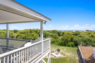 Charming ocean front cottage on the reserved island of Sunset on Oyster Bay Golf Links in North Carolina - for sale on GolfHomes.com, golf home, golf lot