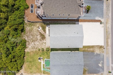 Charming ocean front cottage on the reserved island of Sunset on Oyster Bay Golf Links in North Carolina - for sale on GolfHomes.com, golf home, golf lot