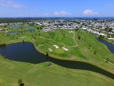 2 bed/2 bath in a cul-de-sac, long driveway w/space for vehicles on Barefoot Bay Golf Course in Florida - for sale on GolfHomes.com, golf home, golf lot