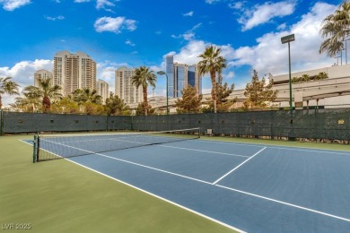 An exceptional corner residence featuring floor-to-ceiling on Las Vegas Country Club in Nevada - for sale on GolfHomes.com, golf home, golf lot
