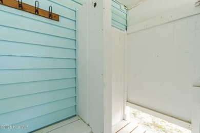 Charming ocean front cottage on the reserved island of Sunset on Oyster Bay Golf Links in North Carolina - for sale on GolfHomes.com, golf home, golf lot
