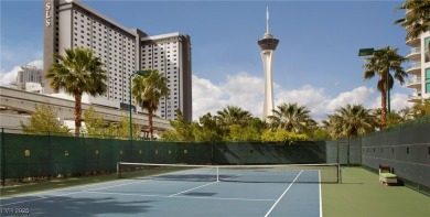An exceptional corner residence featuring floor-to-ceiling on Las Vegas Country Club in Nevada - for sale on GolfHomes.com, golf home, golf lot
