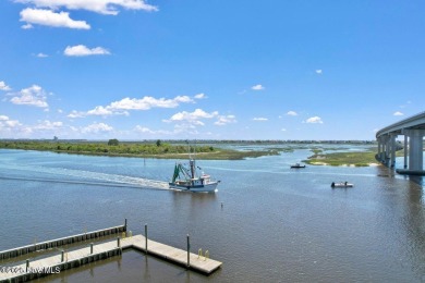 Charming ocean front cottage on the reserved island of Sunset on Oyster Bay Golf Links in North Carolina - for sale on GolfHomes.com, golf home, golf lot