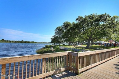 Charming ocean front cottage on the reserved island of Sunset on Oyster Bay Golf Links in North Carolina - for sale on GolfHomes.com, golf home, golf lot