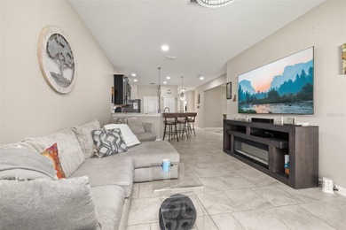 Upscale resort-style living awaits in Champions Gate. This on ChampionsGate Golf Resort in Florida - for sale on GolfHomes.com, golf home, golf lot