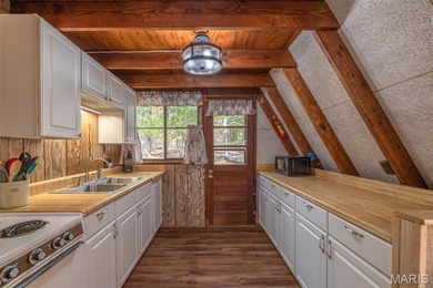 Escape to your own private retreat at Innsbrook Resort! Nestled on Innsbrook Resort Golf Course in Missouri - for sale on GolfHomes.com, golf home, golf lot