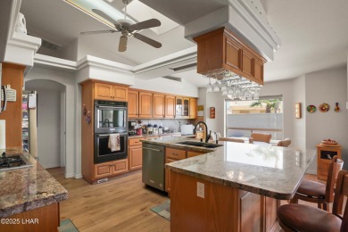 RV garage, side parking, 3+ car garage: this home has room for on London Bridge Golf Course in Arizona - for sale on GolfHomes.com, golf home, golf lot