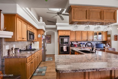 RV garage, side parking, 3+ car garage: this home has room for on London Bridge Golf Course in Arizona - for sale on GolfHomes.com, golf home, golf lot