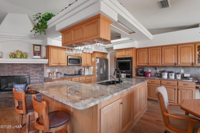 RV garage, side parking, 3+ car garage: this home has room for on London Bridge Golf Course in Arizona - for sale on GolfHomes.com, golf home, golf lot