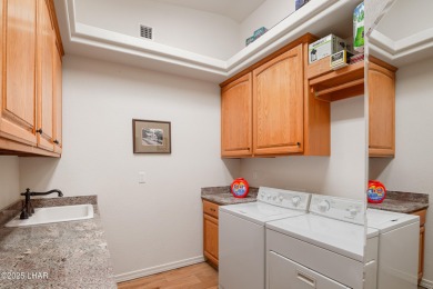 RV garage, side parking, 3+ car garage: this home has room for on London Bridge Golf Course in Arizona - for sale on GolfHomes.com, golf home, golf lot