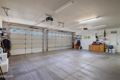RV garage, side parking, 3+ car garage: this home has room for on London Bridge Golf Course in Arizona - for sale on GolfHomes.com, golf home, golf lot