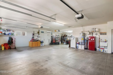 RV garage, side parking, 3+ car garage: this home has room for on London Bridge Golf Course in Arizona - for sale on GolfHomes.com, golf home, golf lot
