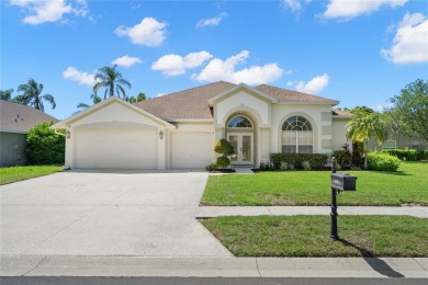 Welcome to this stunning 4-bedroom, 3-bath home featuring a on East Lake Woodlands Country Club in Florida - for sale on GolfHomes.com, golf home, golf lot