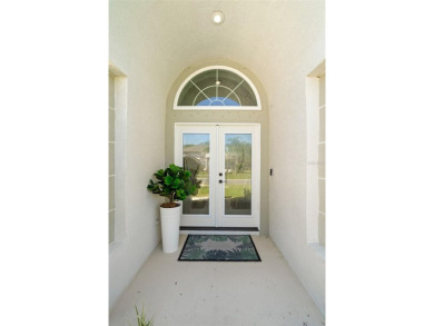 Welcome to this stunning 4-bedroom, 3-bath home featuring a on East Lake Woodlands Country Club in Florida - for sale on GolfHomes.com, golf home, golf lot