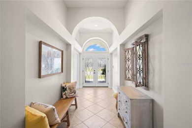 Welcome to this stunning 4-bedroom, 3-bath home featuring a on East Lake Woodlands Country Club in Florida - for sale on GolfHomes.com, golf home, golf lot