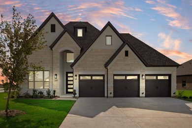 This highly sought-after single-story Altura Aspen floorplan is on Heath Golf and Yacht Club in Texas - for sale on GolfHomes.com, golf home, golf lot